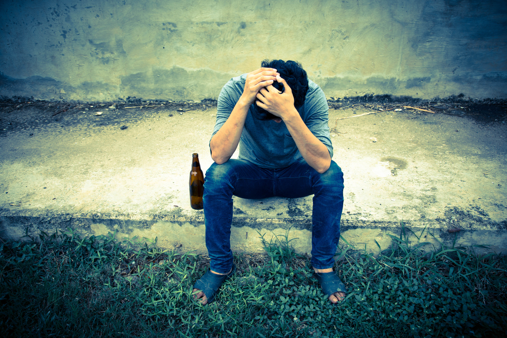 Man with alcohol addiction suffering