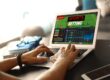 Sports betting on a laptop