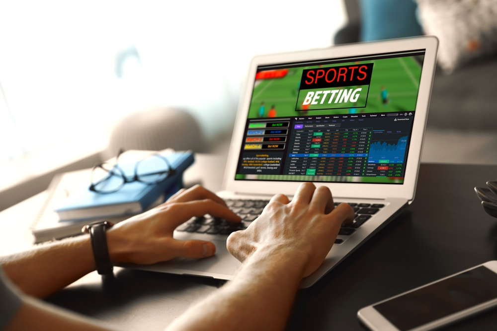 Sports betting on a laptop