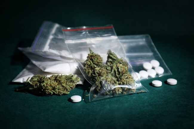 Cocaine,,Dried,Hemp,And,Ecstasy,On,Color,Background Top 3 most used drugs